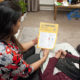 NEA staff read leaflet to homeowner