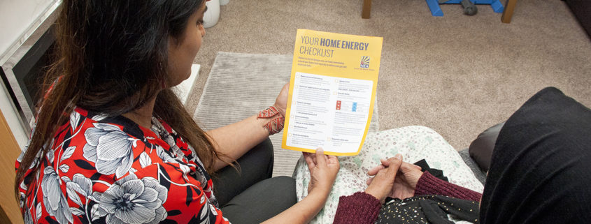 NEA staff read leaflet to homeowner